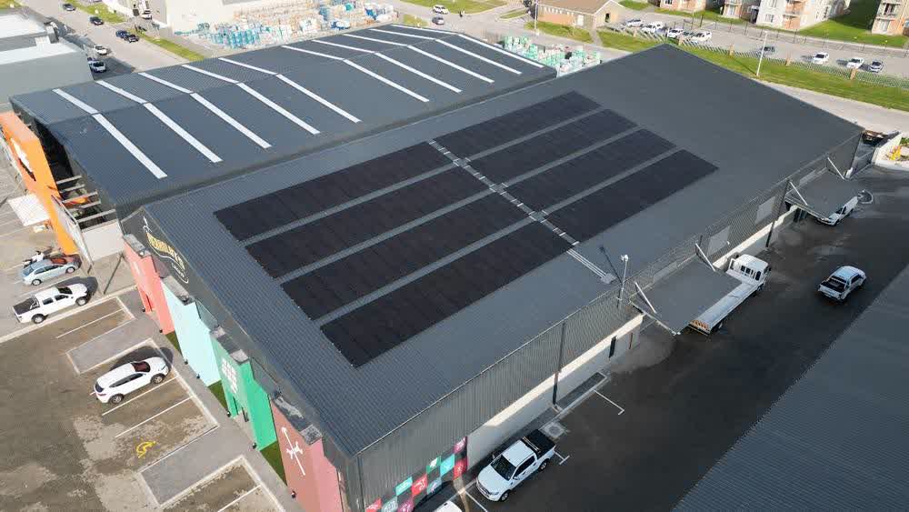 Certified installers managing a commercial solar project